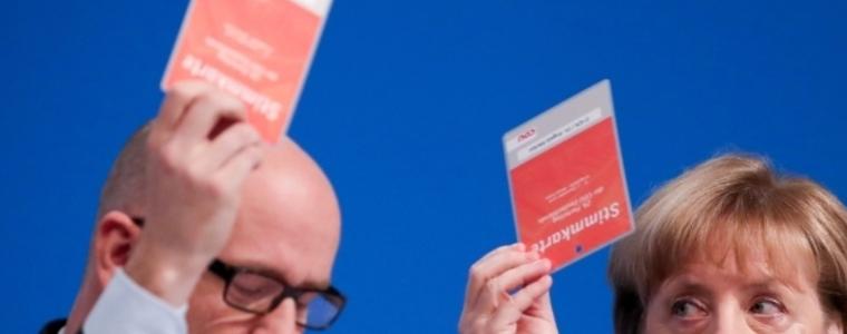 Партията на Меркел подкрепи по-строги правила при двойно гражданство